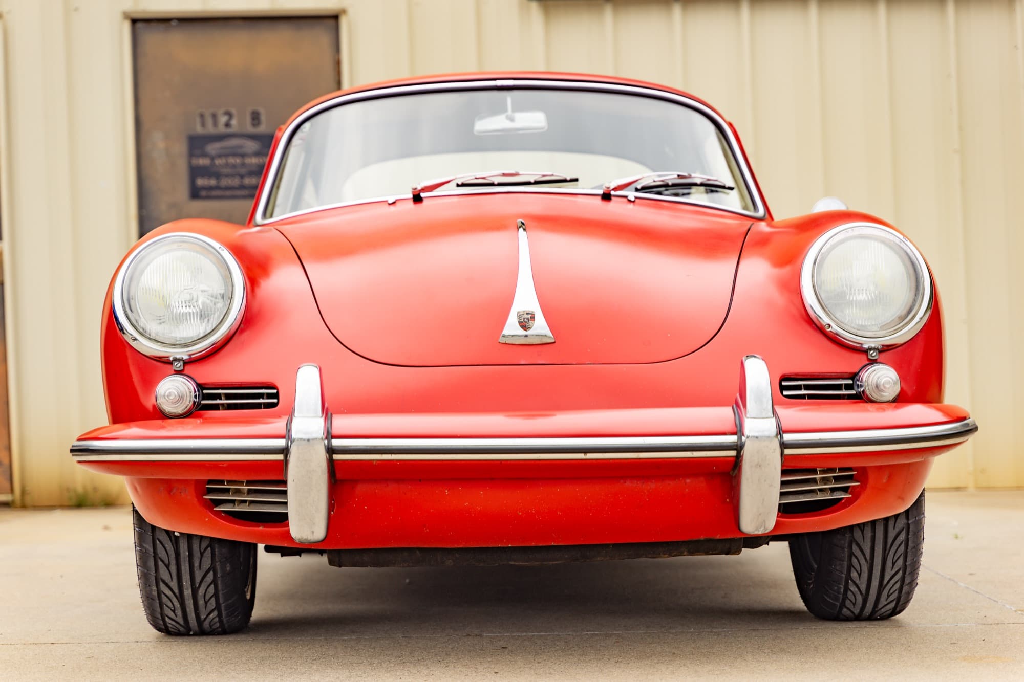 A classic red Porsche 356